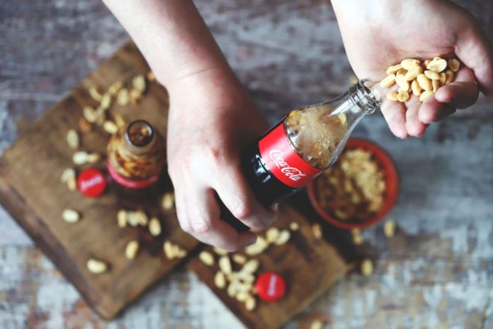 Putting peanuts in Coke is the new trend that’s going viral in the South. Here’s why