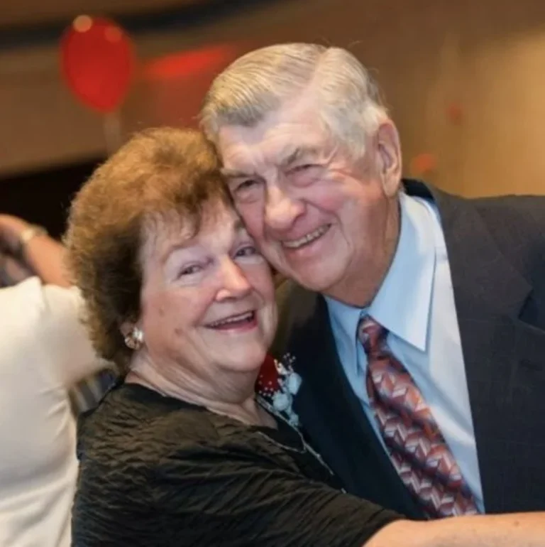 Husband and wife, married for 59 years, greet their 100th grandchild. Four generations together under one roof. Their family photo will astound you.