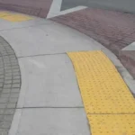 The True Significance Of Those Vibrant Sidewalk Bumps