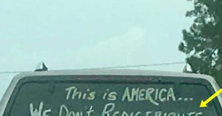 Controversial Message Scrawled On The Back Of An SUV Goes Viral