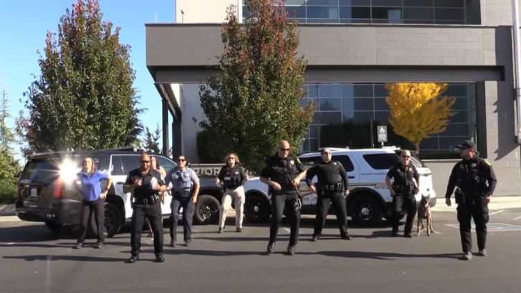 The Police Line Up To Do A Dance Routine But The Police Dog Steals The Show
