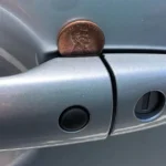 If You See a Penny in Your Car Door Handle, This is What It Might Mean