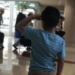 6-year-old boy goes viral after saluting military men at airport.