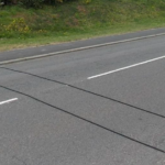If You Ever See Black Cables Stretching Across The Road, This ls What You Should Do