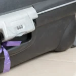 Baggage handler reveals why you should never tie a ribbon on your luggage