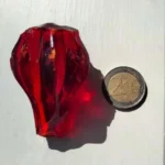 What is this thing? Found in a pile of rubble near my house. Made entirely of solid glass. May not be a complete object because it looks broken on both ends.