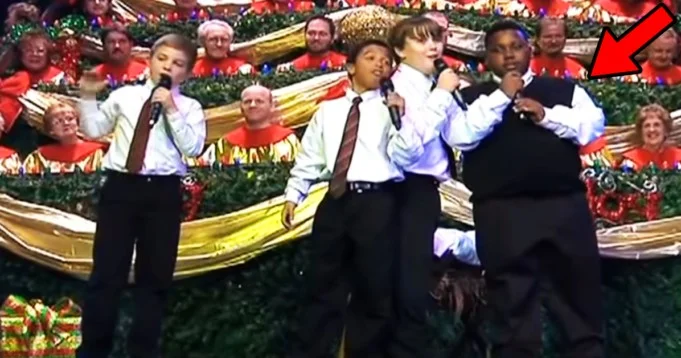 Four boys singing in church is the funniest thing I’ve seen. Keep your eyes on the boy in the vest…